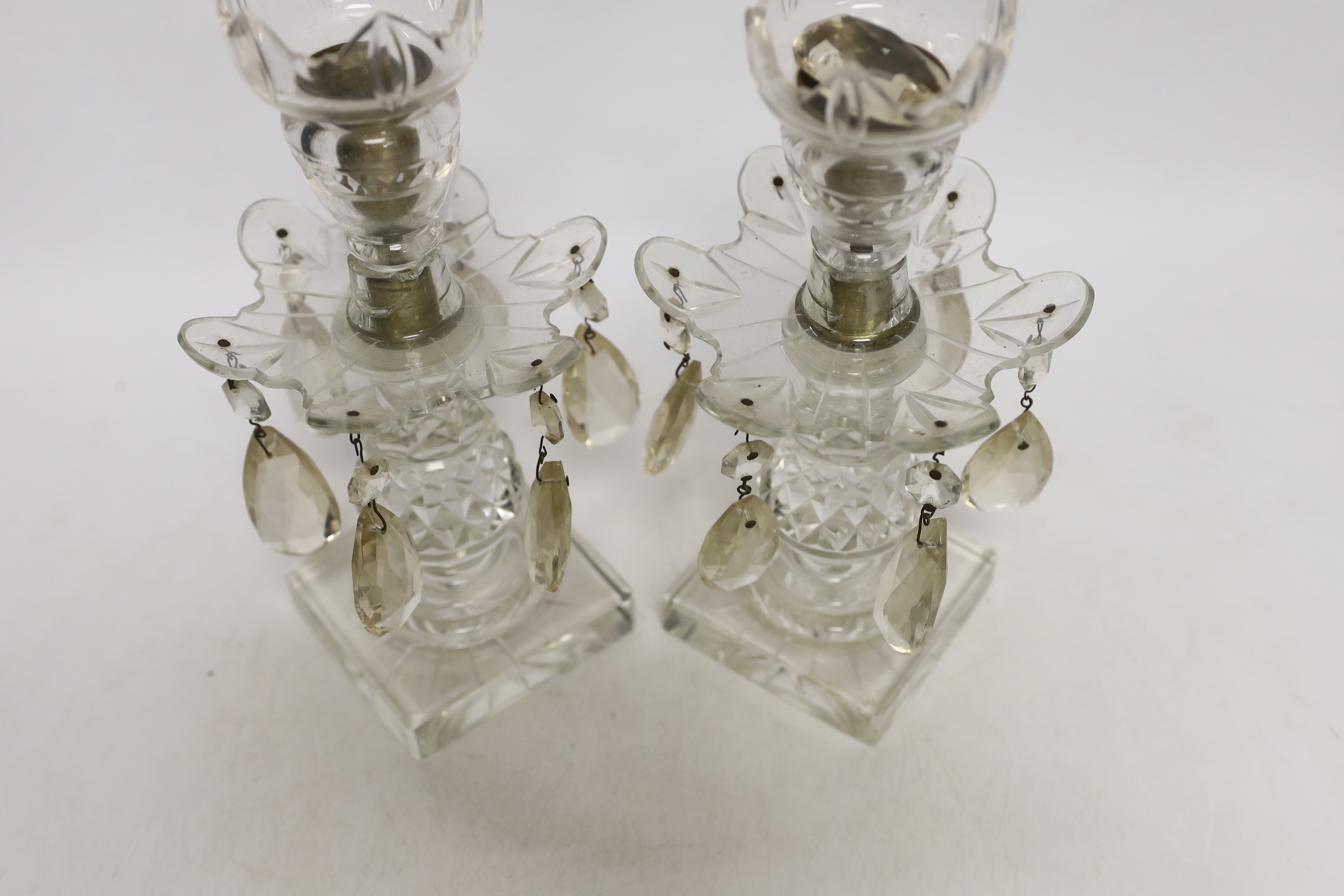 A pair of Victorian cut glass candlestick lustres, 24cm high